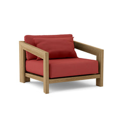 Anderson Teak Smyrna Lounge Armchair in Pomegranate, outdoor teak accent chair with deep seating, available in 9 designer colors.