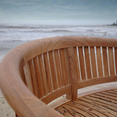 Anderson Teak Curve 3-seater bench in bright orange with extra thick wooden slats and modern design.