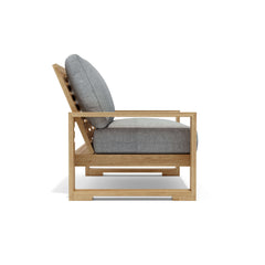 Anderson Teak Capistrano deep seating loveseat in designer color options, showcasing plush cushions and stylish outdoor seating design.