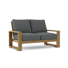 Anderson Teak Capistrano Deep Seating Loveseats in natural canvas, outdoor patio furniture for small spaces, available in 9 designer colors.
