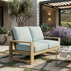 Anderson Teak Capistrano deep seating loveseat for outdoor patio, in natural canvas, designed for small spaces, with 9 color options