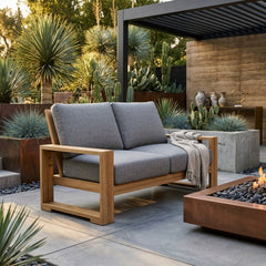 Anderson Teak Capistrano Deep Seating Loveseat in natural canvas fabric for outdoor patio, available in 9 designer colors.