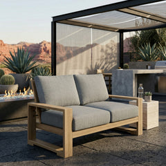 Anderson Teak Capistrano deep seating loveseat in natural canvas fabric, outdoor patio furniture for small spaces with 9 designer colors