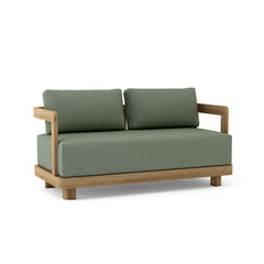 Anderson Teak Granada deep seating loveseat in one of nine designer colors, featuring plush cushions and a stylish outdoor design.
