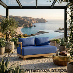 Anderson Teak Granada Deep Seating loveseat in cast mist finish, outdoor patio style, designed for small elegant spaces, available in 9 colors.