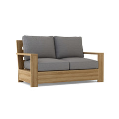 Anderson Teak Madera Deep Seating Loveseat in 9 designer colors, featuring modern wooden frame and plush cushions.