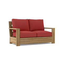 Anderson Teak Madera Deep Seating loveseat outdoor patio furniture in cast mist color, designed for small elegant spaces.