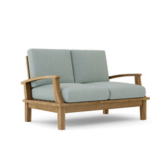 Anderson Teak Brianna deep seating loveseat in a stylish design, available in nine designer colors, perfect for outdoor lounging.