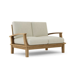 Anderson Teak Brianna deep seating loveseat in a designer color, showing plush cushions and stylish, modern outdoor furniture.