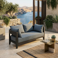 Anderson Teak Coronado Aluminum outdoor patio loveseat in cast pomegranate, designed for small spaces with 9 stylish color options