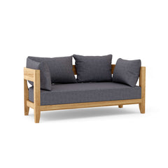 Anderson Teak Coronado deep seating loveseat in one of nine designer colors, featuring plush cushions and stylish outdoor furniture design.