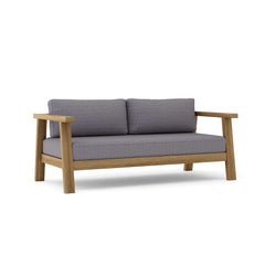 Anderson Teak Palermo Deep Seating Loveseat in vibrant designer color, showing plush cushions and stylish teak frame.