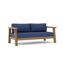 Anderson Teak Palermo deep seating loveseat in one of nine designer colors, featuring plush cushions and stylish outdoor furniture design.