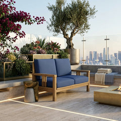 SouthBay deep seating teak wood loveseat by Anderson Teak, showing stylish outdoor loveseats in vibrant cast pomegranate color.