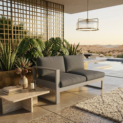 Anderson Teak Lucca right loveseat with teak wood frame and plush cushions, ideal for outdoor lounging and stylish patio seating.