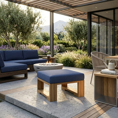 Capistrano deep seating ottoman by Anderson Teak in 9 designer colors, showcasing a stylish, cushioned footstool with wooden accents.