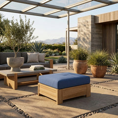 Copacabana ottoman by Anderson Teak in 9 designer colors, showing a stylish, cushioned footstool with a wooden base and vibrant fabric.