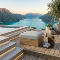 Colorful Copacabana ottoman by Anderson Teak in 9 designer shades, serving as a stylish footstool or additional seating.