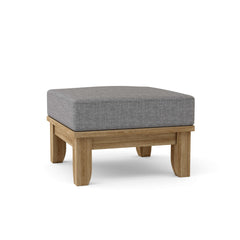 Luxe Anderson Teak ottoman with cushion in one of nine designer colors, showcasing a stylish and comfortable footstool.