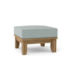 Riviera Ottoman by Anderson Teak in one of nine designer colors, showcasing a modern wooden footstool with sleek design.