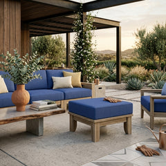 Riviera Ottoman by Anderson Teak in 9 designer colors, showcasing a stylish and versatile footstool with wooden legs and plush cushion.