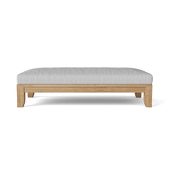 Anderson Teak Riviera 60-inch outdoor daybed in cast pomegranate, with teak frame and colorful cushions for garden lounging.