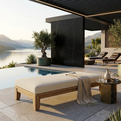 Anderson Teak Riviera 60-inch outdoor daybed in cast pomegranate, showcasing a luxurious teak patio lounge with 9 designer colors.