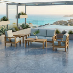 Southbay Teak outdoor sofa set by Anderson Teak featuring natural teak wood and deep seating for garden lounge comfort.