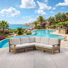 Anderson Teak Riviera teak wood outdoor sectional sofa with natural canvas cushions, garden lounge, in a stylish design.