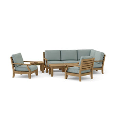 Outdoor sectional sofa set by Anderson Teak with teak wood frame, neutral cushions, and available in nine designer colors.