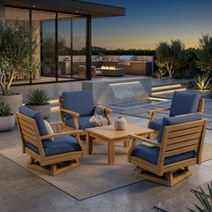 Anderson Teak Riviera Teak Wood outdoor sofa set with deep seating, natural canvas cushions, in a garden lounge setting.