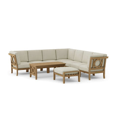Anderson Teak Natsepa modular teak outdoor sofa set with cushions, in a garden lounge setting, featuring nine designer colors.