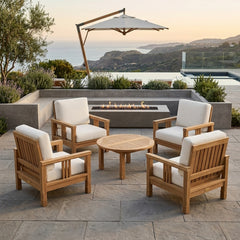 Anderson Teak Southbay outdoor sofa set with four armchairs and a table in natural teak wood, available in nine designer colors.