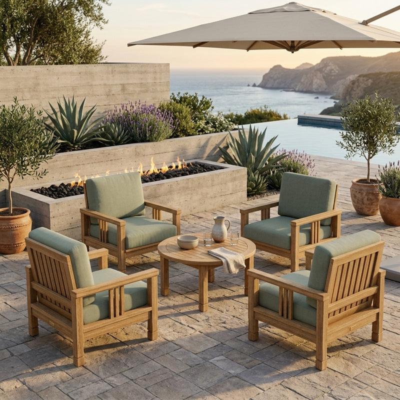 Anderson Teak Southbay Teak Wood outdoor patio 5-piece seating set with four armchairs and table in cast mist color.