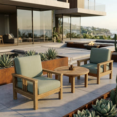 Anderson Teak Southbay Teak Wood Deep Seating 3-Piece Outdoor Sofa Set with 2 armchairs and table in a garden lounge setting.