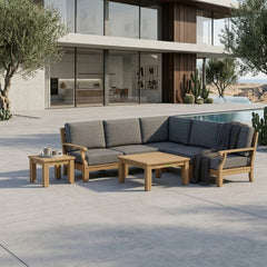 Anderson Teak Riviera Teak Wood Outdoor Sofa Set with deep seating, featuring plush cushions in a garden lounge setting.