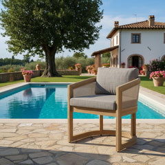 Anderson Teak 11-piece Catania outdoor dining set with teak table and sofa in cast pomegranate color for patio outdoor living.
