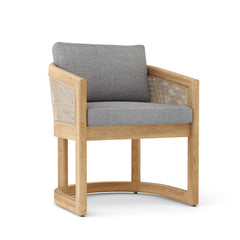 Outdoor sofa from Anderson Teak's 11-piece Catania dining set in cast pomegranate A-grade teak, with 9 designer color options.
