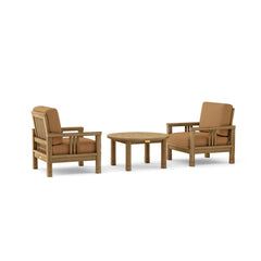 Anderson Teak Southbay outdoor sofa set with two armchairs and a table in vibrant cast pomegranate color, perfect for garden lounging.