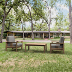Southbay Teak Wood outdoor sofa set with two armchairs and table in cast pomegranate color by Anderson Teak for garden lounge.