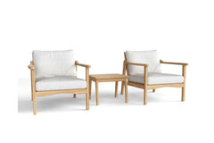 Anderson Teak Amalfi outdoor deep seating set with two armchairs and table in vibrant cast pomegranate color, perfect for garden lounge.