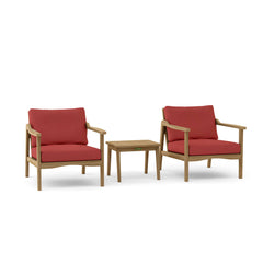 Anderson Teak Amalfi teak wood outdoor deep seating set with two armchairs and table in cast pomegranate color.