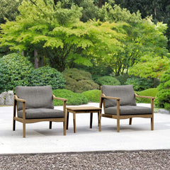 Anderson Teak Amalfi outdoor teak deep seating set with two armchairs and table in vibrant pomegranate color, perfect for garden lounge.