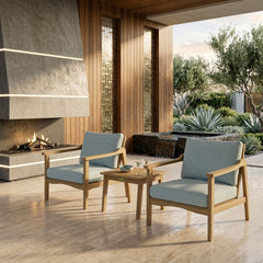 Anderson Teak Amalfi Teak Wood outdoor patio deep seating set with 2 armchairs and table in vibrant pomegranate color.