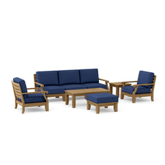 Anderson Teak Riviera modular outdoor sofa in cast pomegranate, deep teak wood seating with colorful cushions for garden lounge.
