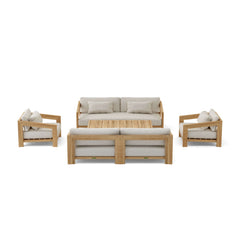 Anderson Teak Smyrna outdoor sofa set with deep seating, teak wood frame, and colorful cushions for garden patio lounging.