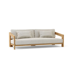 Anderson Teak Smyrna outdoor deep seating sofa set with plush cushions and designer color options for garden lounge relaxation.