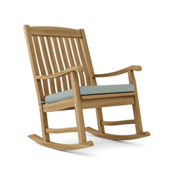Colorful IPANEMA rocking armchair by Anderson Teak with a sleek design, available in nine designer shades, ideal for relaxing outdoor spaces.