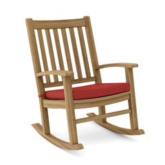Colorful Anderson Teak Palm Beach rocking armchair with curved wooden frame and plush cushion, ideal for outdoor relaxation.