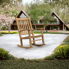 Palm Beach rocking armchair by Anderson Teak in one of nine designer colors, featuring a sleek wooden frame and comfortable design.